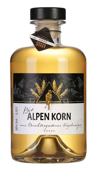 Flasche Bio Alpen Korn Spirituose mit schwarzem Etikett und goldenem Korn-Motiv